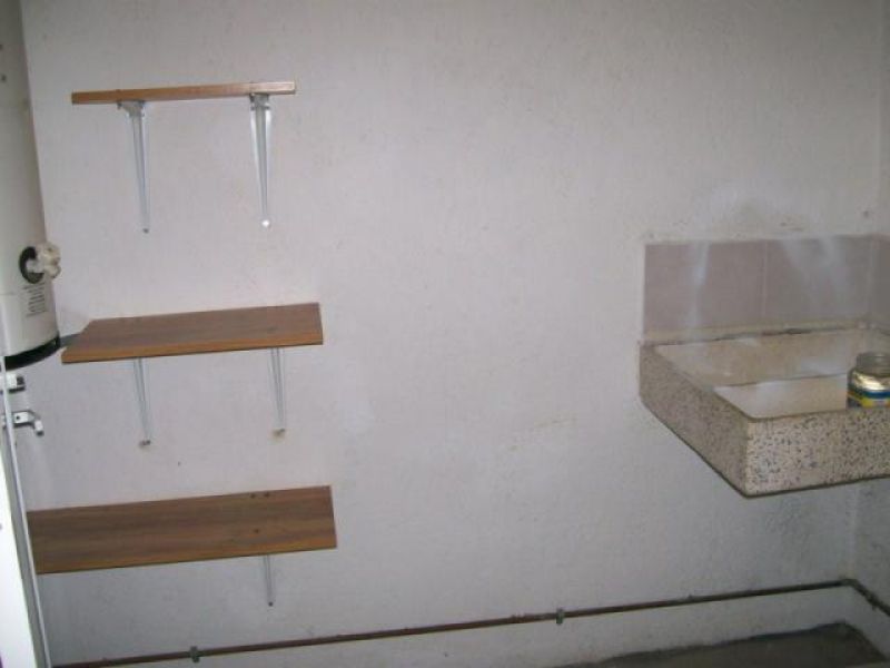 {"esp":"Patio de Servicio"}